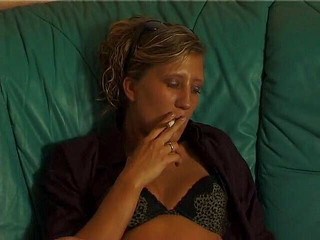 Lonely brunette chick is filling her pussy with a big dildo