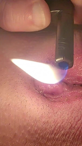 Sexy Shaved Pussy and Clit Teased and Singed with Flame
