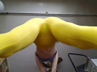 Yellow stretch pants squats