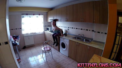 Green sexy corset and black pantyhose with high heels!