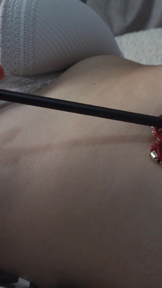 Latina Girl Plays with Her Belly and Navel with Her Fingers and Then Plays with It with a Paintbrush