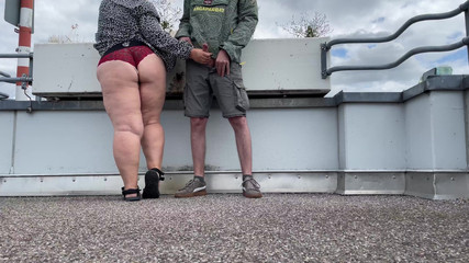 Spanking My Stepmother in Law's Gorgeous Fat Ass While She Jerks off My Cock on the Top of the Parking Lot