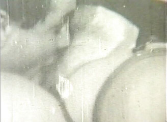 Vintage couple having passionate oral sex