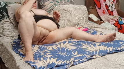 Neighbor Caresses Herself and Masturbates Her Big Pussy