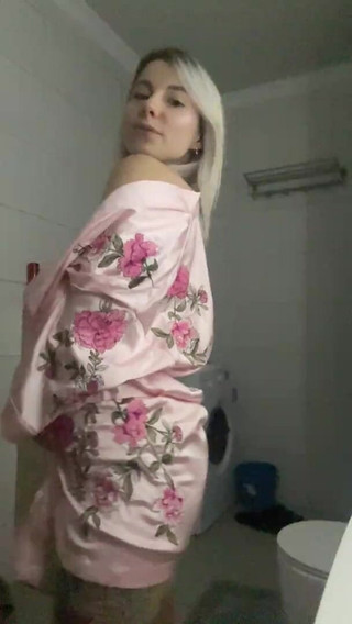 Big-boobed Babe Dancing in the Bathroom