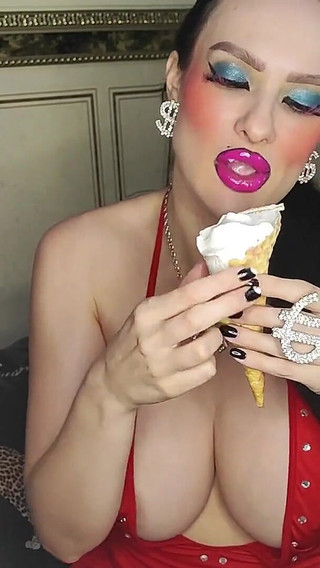 Big-lipped Bimbo with Glossy Lipstick Eats Ice Cream