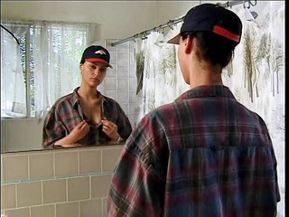 Hot brunette in boy's clothes caress herself.