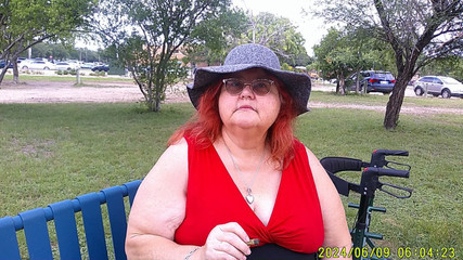 Nurse Vicki Smoking in the Park on a Bench All Dressed up