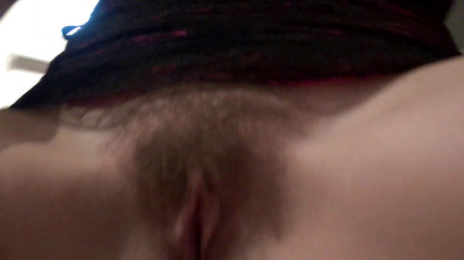 Fingering a young hairy pussy in kitchen