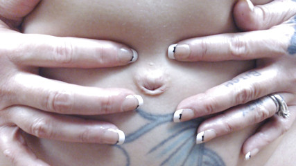 Belly button stretching fingering