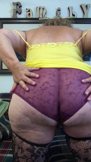 Sexy horny Granny takes off her nasty panties