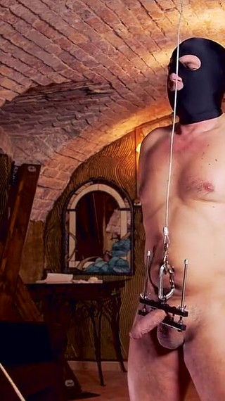 Whipping on restrained dick