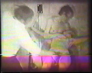 Classic bondage movie with two dudes anal fucking brunette