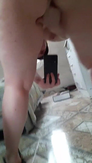 Girl Masturbates in Front of the Mirror Showing Her Big Ass