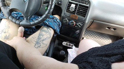 Masturbation of a Penis in a Car in the Parking Lot