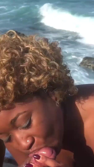 Hot ebony girls fucks on beach