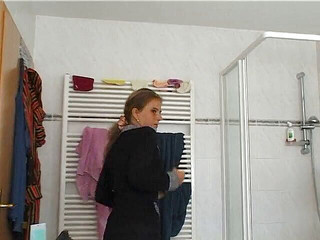 Lovely amateur brunette is taking a shower