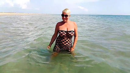 Stranger Looking on Me in the Beach