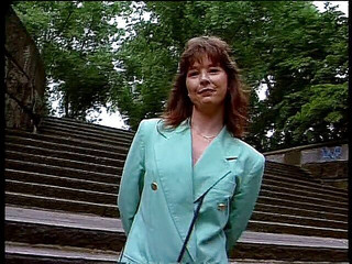 Beautiful brunette lady at the outdoors interview