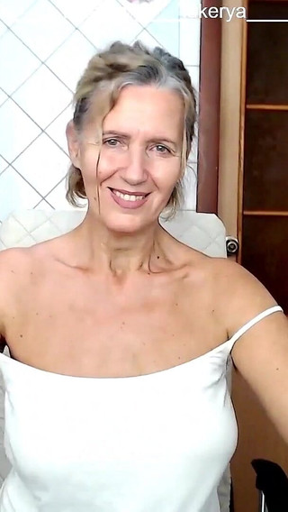 Cheerful Lukerya with Bouncing Boobs Communicates in the Kit