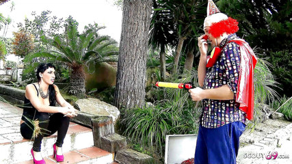 Clown fucks horny slut milf Suhaila in the ass at a party and gives her a cumshot