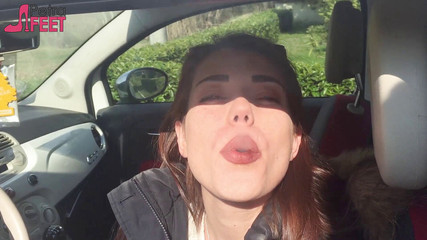 Adorable Italian girl loves smoking in the car