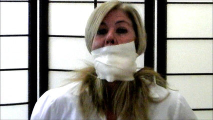 Bondage gear seller's gag demonstration!