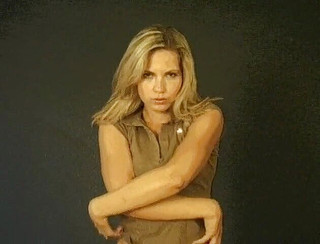 Tempting blonde girl likes getting naked in front of the camera