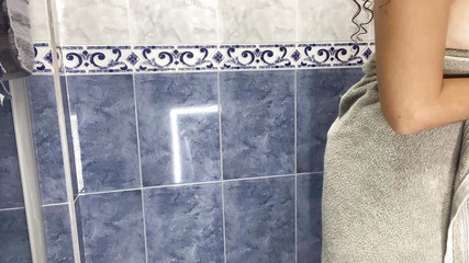 Stepdaughter Oiling Herself in the Bathroom