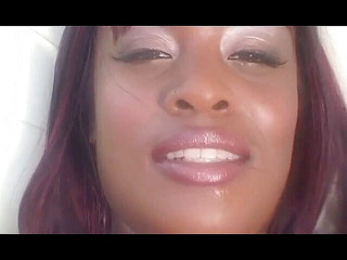 Watch her get on her knees and suck on two black cocks