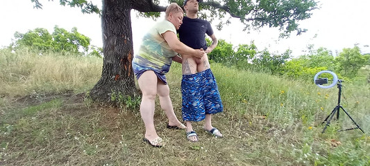 Fingering my cock in a park