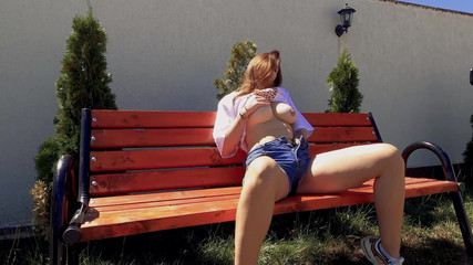 Blonde Bombshell's Steamy Bench Pleasure