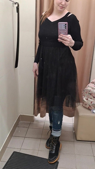 What Words Pop Into Your Head When You Look at the Red-haired Mistress in the Black Dress?